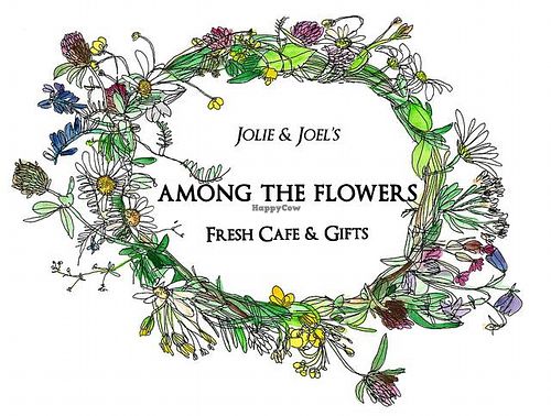 Our Happy Logo at Among The Flowers Cafe in Sanibel