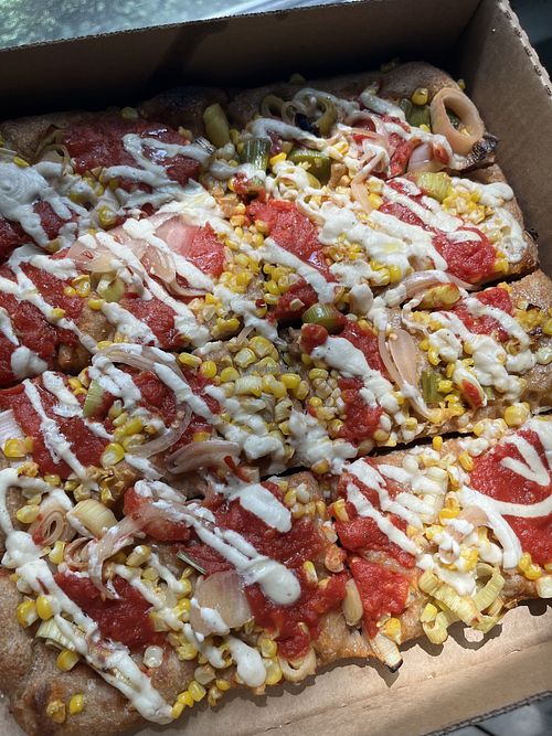 Roasted corn, leek, pickled onion, and cashew cream   at Red Hound in Takoma Park