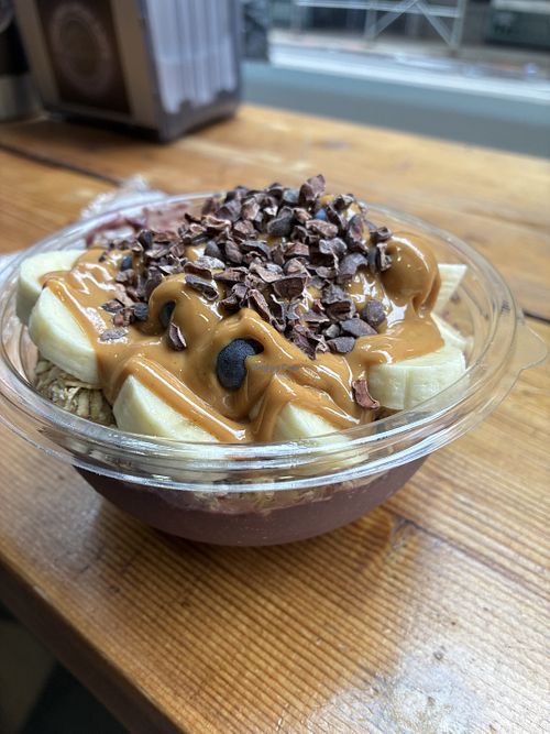Peanut butter açaí with granola, dark chocolate nibs and fruit  at Chelsea Acai Cafe  in New York City