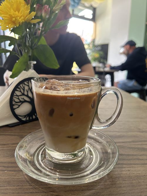 Iced latte with oat milk  at Aliona in Bolton