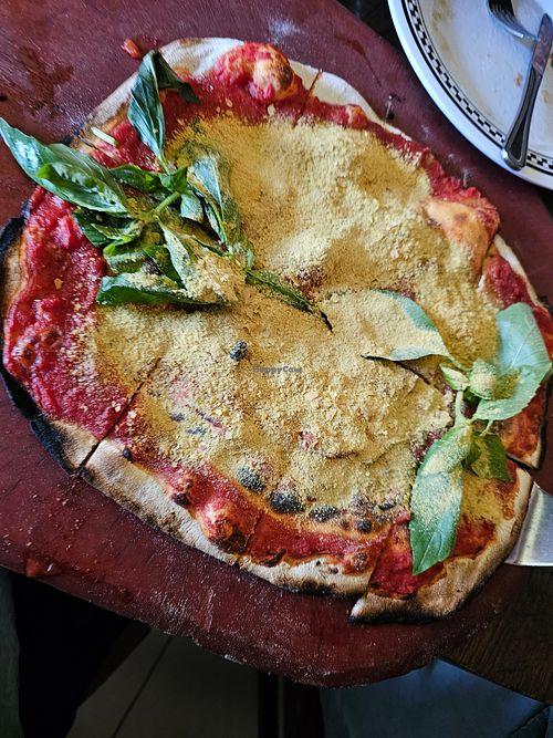 Margherita Pizza without Cheese or Butter. I added nooch! at Anthony's Coal Fired Pizza & Wings in Miami