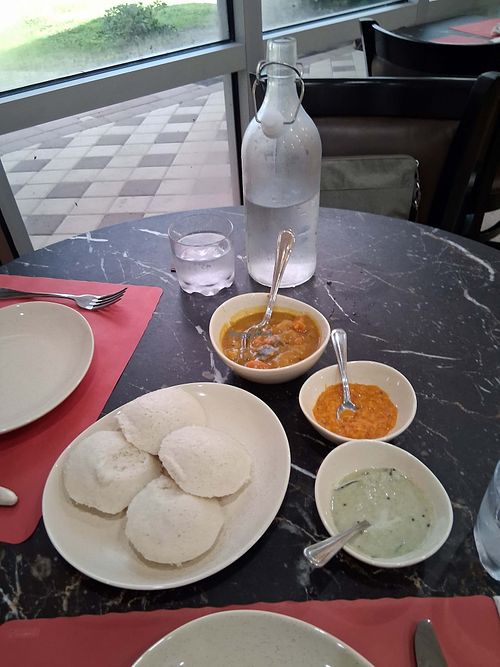 Idli with Sambar Sauce and Churneys at Magic Masala Indian Cuisine in Naples