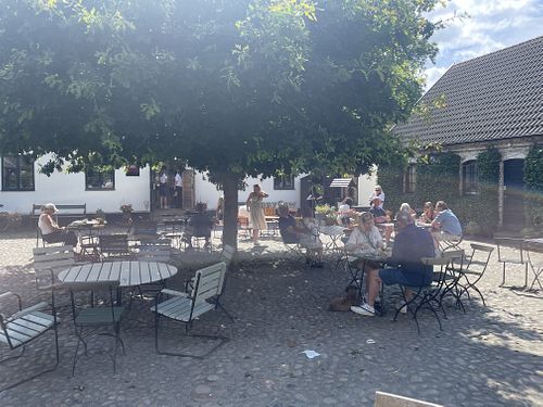 Outdoor seating in the courtyard  at Olof Viktors Café in Skåne Län