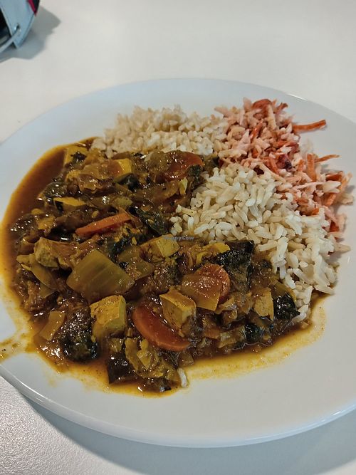 Creamy mushroom and cabbage stew (soya) with brown rice and mix vegetable salad at Community Cafe in North London