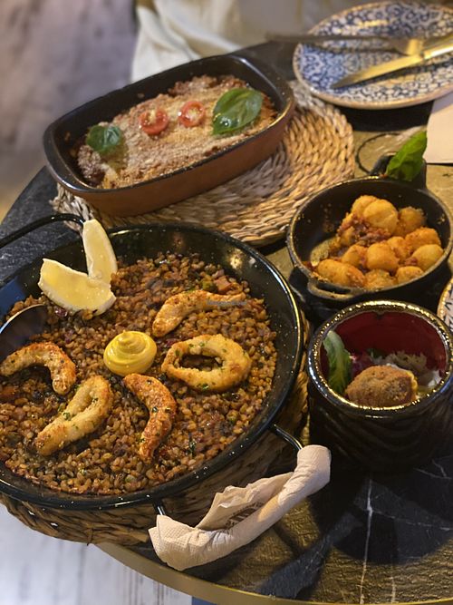 Vegan seafood Paella and Lasagna  at Bubita Bar in Barcelona