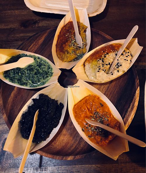 Sauce ‘boats’ with pita bread at Bubita Bar in Barcelona