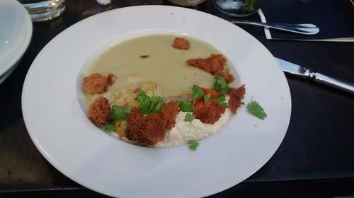 Cucumber gazpacho with vegan cheese and vegetables at Charlie Was a Sinner in Philadelphia