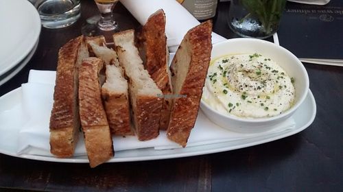 Ricotta and grilled bread at Charlie Was a Sinner in Philadelphia