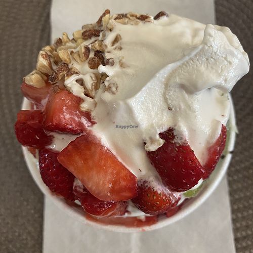 Extreme Close-Up of Vanilla Oat Milk Froyo w/Kiwi, Strawberries, and Almond Chunks YUM! 😋 Size Smalll  at Yogurt Mill in Modesto