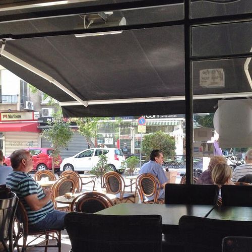 From inside looking out  at Cafe Cafe - Yehuda Maccabee in Tel Aviv