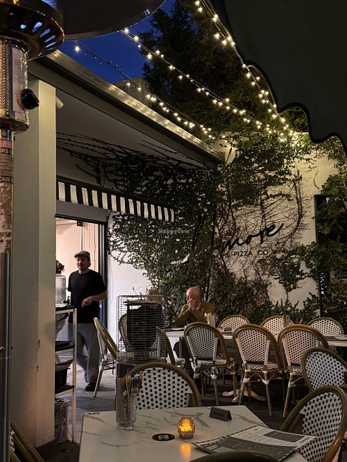 Outside is comfy, and lovely vibe.   at Amore Pizza  in Coolum Beach