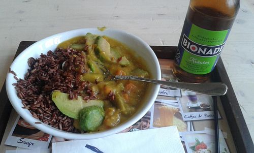 Brown Rice with curry, avocado, sweet potatoes and aubergine. at My Indigo in Frankfurt
