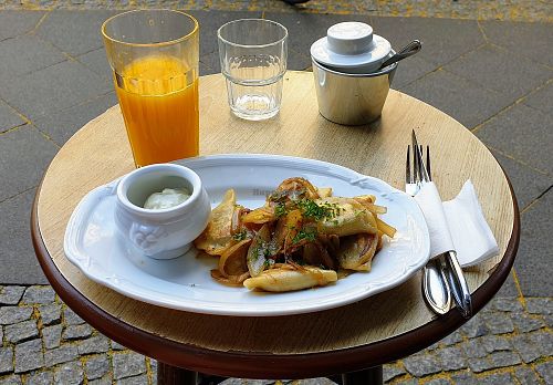 Vegan Wareniki, filled with mushrooms and potatoe, served with fried onions and vegan sour creme. Just a smallish portion but delicious and exactly what I was looking for! at Wo der Bär den Honig holt in Berlin