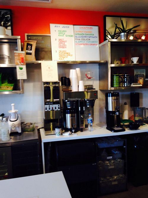 Menu board and prep area at PRESS in Washington