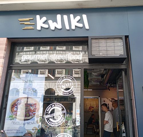 Storefront with posted menu - many vegan options at Kwiki - gourmet streetfood in Wien