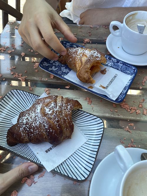 Plain vegan croissant and marmelade vegan croissant with soy cappuccino  at Caffè Bertini 32 in Bologna