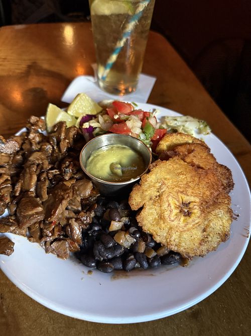 Mushroom and plantain bowl with black beans, rice, and delicious avocado salsa   at Low Tide Lounge in Portland