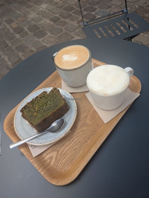 Latte with banana milk, cappuccino with soy milk and vegan pistachio cake at Latte Coffee in Hauts-de-france