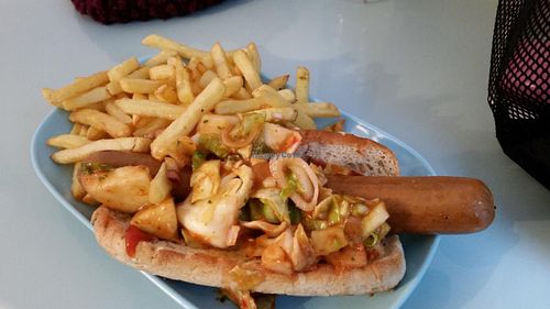 Smoky sausage role with the hot relish. And French Fries.  at Astrid och Aporna - Astrid og Aberne in Copenhagen