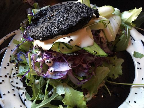 Vegetable pancake with salad and zucchini carpaccio  at Soda in Alba