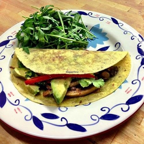Tortilla with seiten, peppers, onions, chilli, avocado and brown rice at Yuli's Lunch Box in Haifa