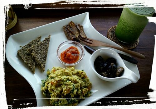 Classic breakfast - scrambled 'eggs', aubergine bacon, raw bread, marinates mushrooms, salsa. at The Seeds of Life in Ubud