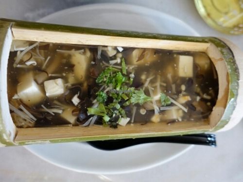 Tofu broth in bamboo stem  at Kak Lynn's Kitchen in Tangkak