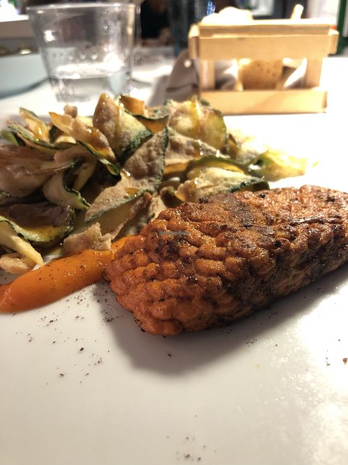 3D-printed plant-based “salmon” fillet, served with sautéed vegetables, crispy nori seaweed, and sweet & spicy mango sauce  at Ristorante Frontemare in Veneto