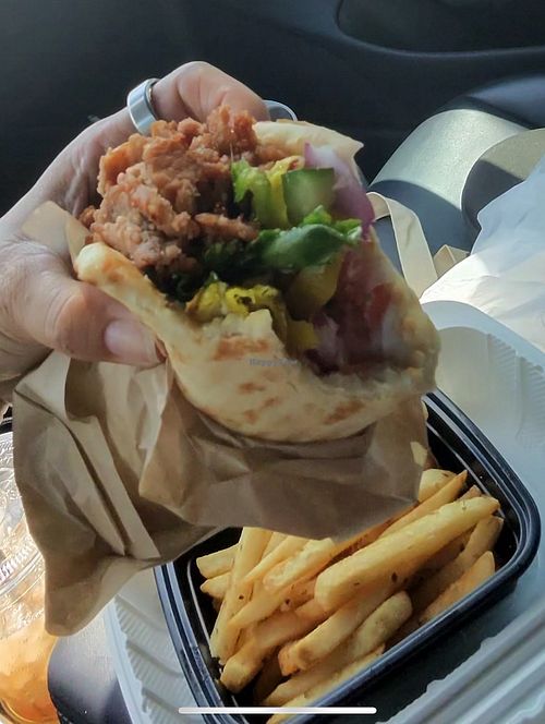 Build your own with plant based gyro meat, garlic spread, tomato, onion, Kalamata olives, dill cucumbers, spinach, and peperoncini. Yum!  at Apola Greek Grill in Santa Clarita
