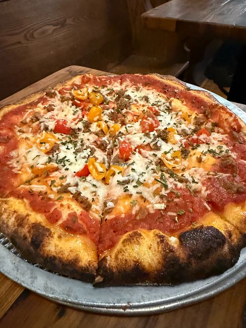 "The Vegan" with beyond meat, red sauce, pepadews, and chives at Raffy's on 36th in Baltimore