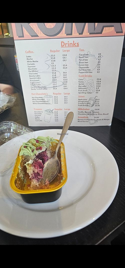 Pistachio and raspberry loaf vegan and gluten free! at Roma Cafe & Lounge in England