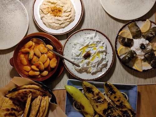 Hummus, giant beans, pita, dolmades (other dishes are tzatziki and feta filled peppers - vegetarian, not vegan) at Louis Family Restaurant in Rhode Island