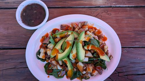 Side of black beans(they don't use meat broth or lard!), raw spinach, home fries, and avocado. at Food Bash in Winchester