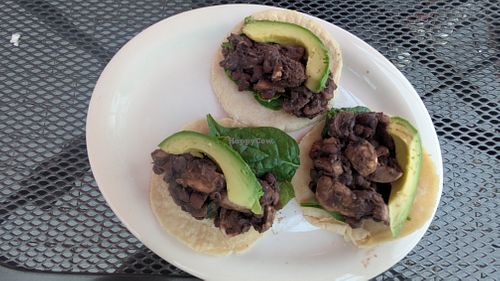 Order these sides to make tacos! Black beans, avocado, corn tortillas, uncooked spinach & mushroom. Cut up the mushrooms & mix them into the hot beans to soften & soak up flavor! at Food Bash in Winchester