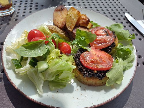 Fried eggplant with potatoes and salad at Restauracja Vis'a'Vis in Województwo Dolnośląskie