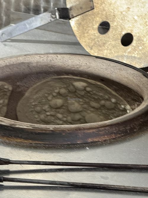 Bread being made fresh in front of you  at Baghdad in London
