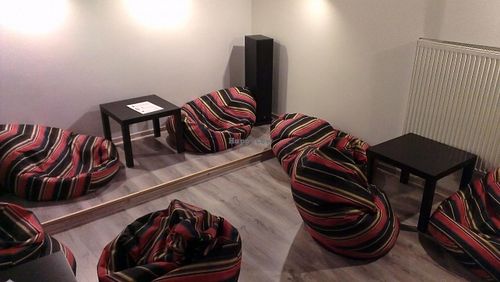 Mysa interior with pillows at Mysa in Warsaw