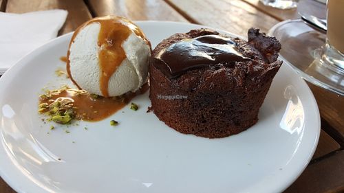 Warm chocolate cake with ice cream in hazlenut butter at Anastasia in Tel Aviv