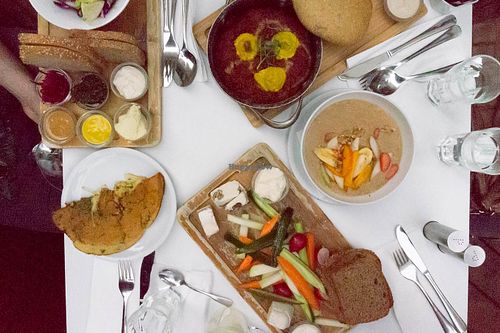 Omelette, different spreads, Shakshuka with polenta, porridge, vegan cheese platter - all delicious!  at Anastasia in Tel Aviv