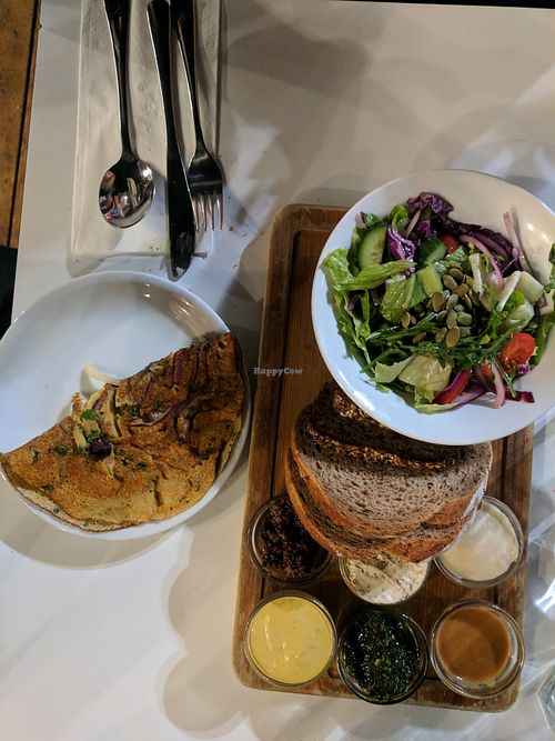 Breakfast with chickpea omlete  at Anastasia in Tel Aviv