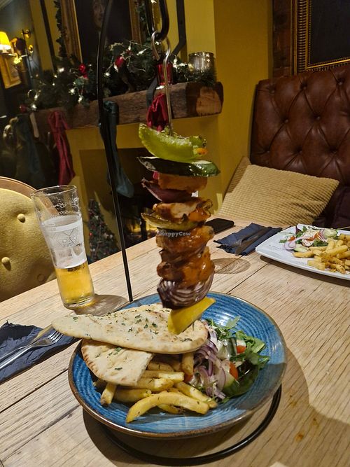 Piri Piri No Chicken Hanging Kebab: chili, lemon, paprika, oregarno, honee, garlic, dressed salad, flatbread, fries at the Drum & Monkey, Alderley Edge in England