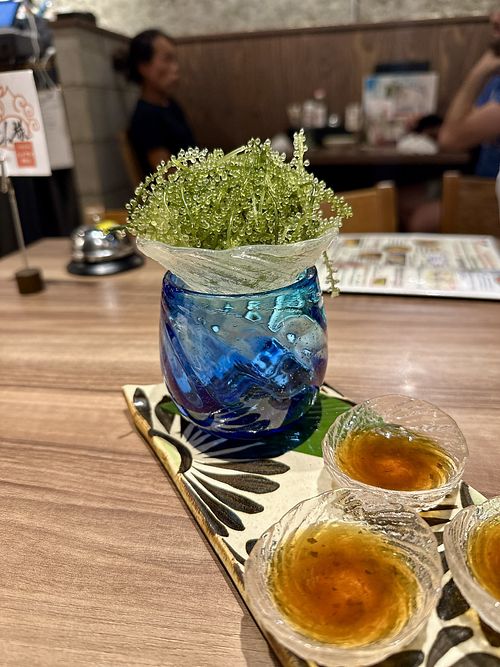 Sea grapes with dipping sauce  at Okinawa Bar Haisai Ginza Store in Tokyo