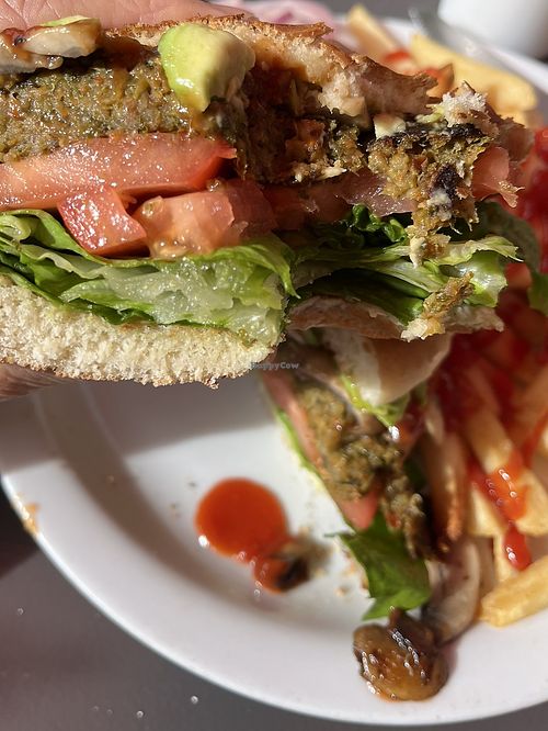 Love a house made garden burger! Quinoa and black bean with sautéed mushrooms and half an avocado. Be sure to ask NO MAYO.  at Miracle Mile Cafe in San Rafael