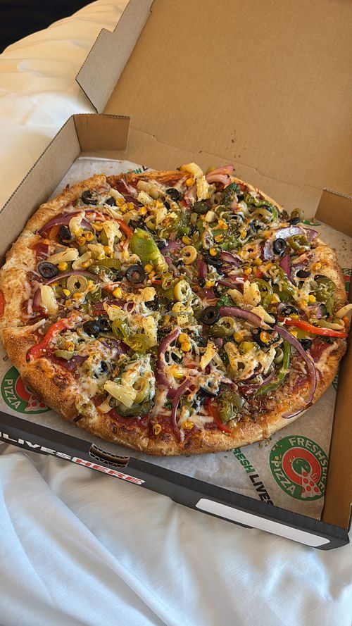 Vegan pizza with all the veggies   at Freshslice Pizza in Vancouver