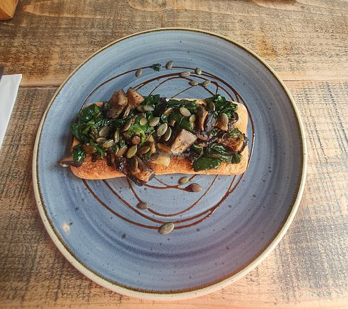 Garlic Mushrooms On Rustic Toast (VE) Roasted mushrooms with spinach on toasted rustic ciabatta. at The Bank in England