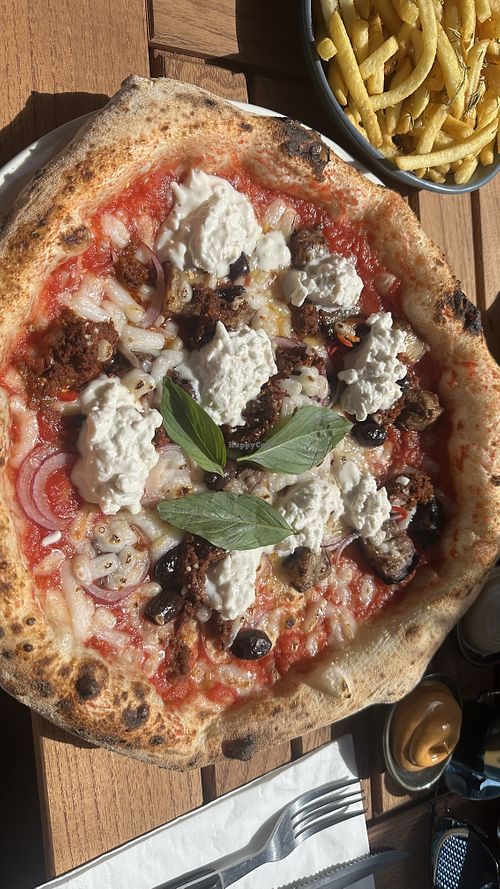Pizza with added vegan burrata   at Fatto a Mano Covent Garden in London