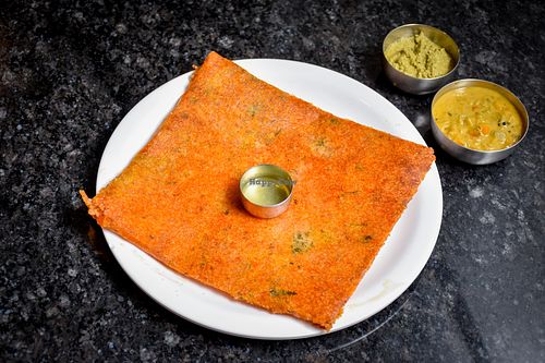 Rava dosa filled with a flavorful
mixture of spiced potatoes and onions,
offering a delightful combination of
textures and tastes. at MTR Kathmandu - Kamalpokhari -Vegetarian Restaurant in Kathmandu