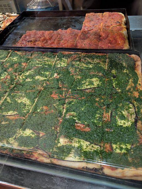 Foccacia with tomato sauce (back) and tomato sauce, eggplant and pesto (front) at La Focacceria in Berlin