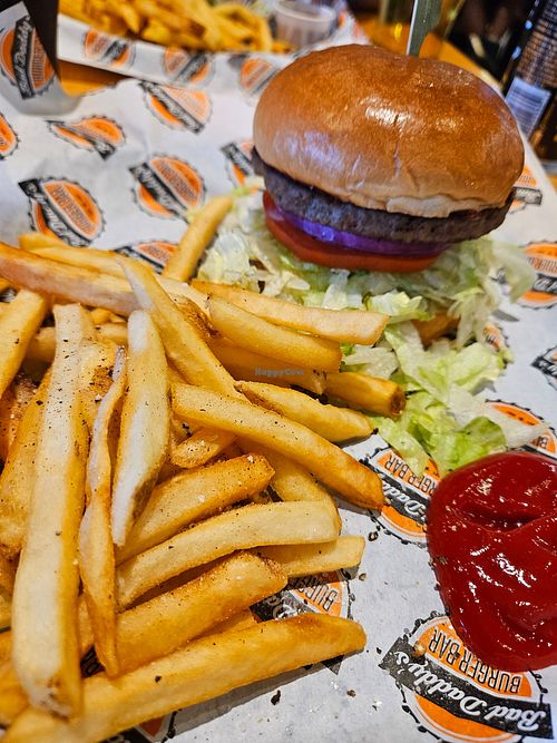 Basic Burger and fries, but when options are limited it works. at Big Daddy's Burger Bar in Charlotte