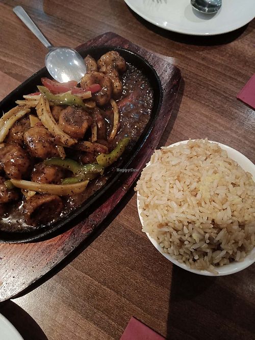 Black pepper chikn with ginger fried rice at Lotus Plant Based Kitchen in Manchester